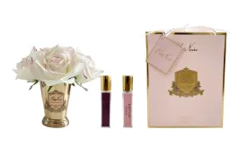 Blush seven rose bouquet diffuser in a gold vase
