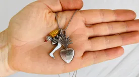 Milagro Pendants Necklace. Mexico. Sterling Silver and Amber.